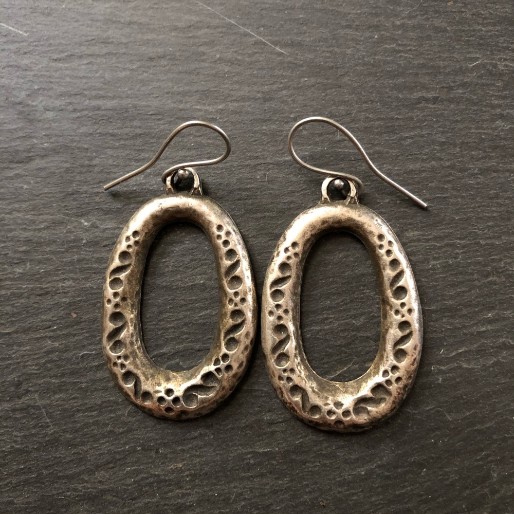 Cast base metal and stainless steel earrings